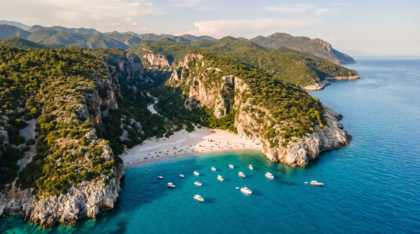 Aerial view of Gjipe beach hidden between canyon cliffs